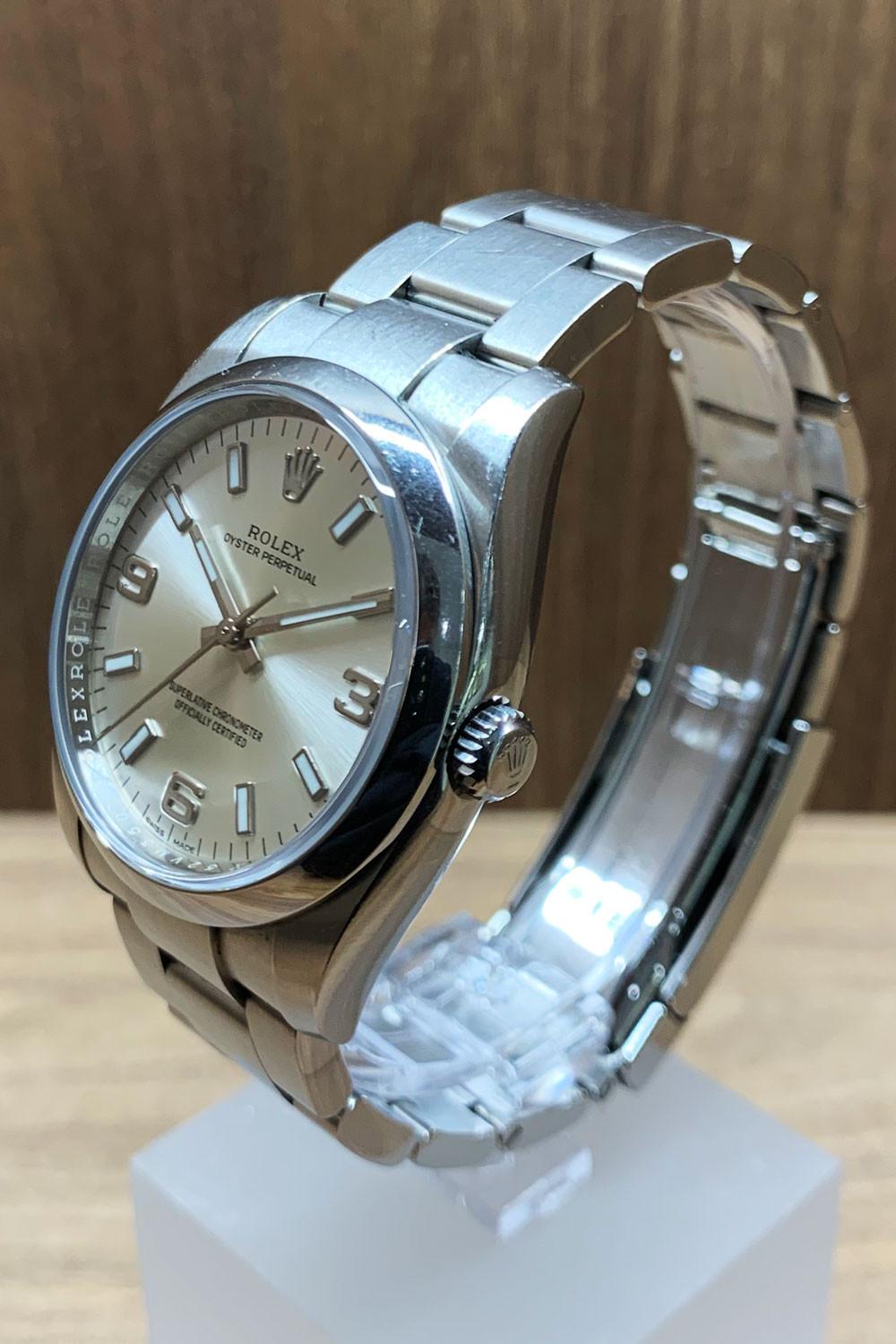 BEGAGNAD Rolex Oyster Perpetual 34 mm, silver och stålarmband 114200