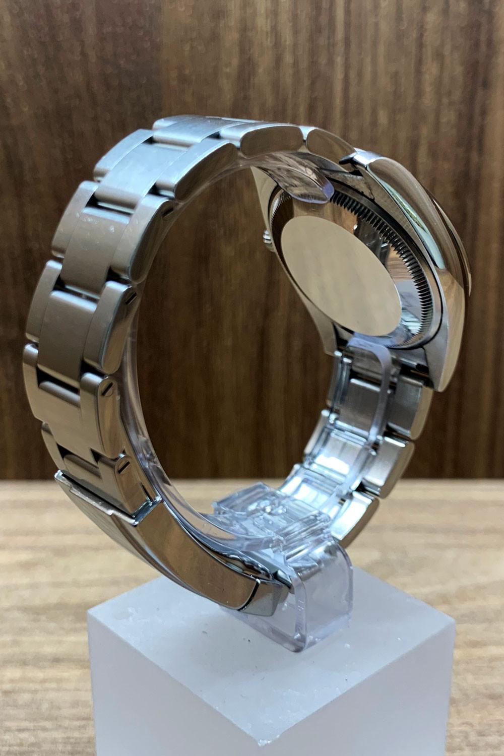 BEGAGNAD Rolex Oyster Perpetual 34 mm, silver och stålarmband 114200