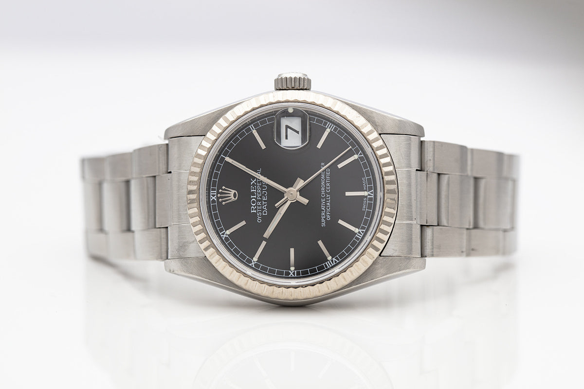 BEGAGNAD Rolex Datejust 31mm stål & svart Ref 78274