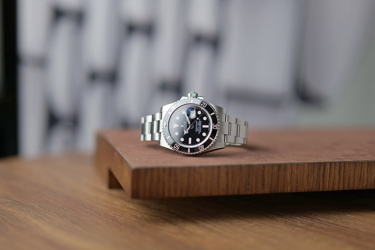 PRE-OWNED Rolex Submariner Date Svart 116610LN År 2013