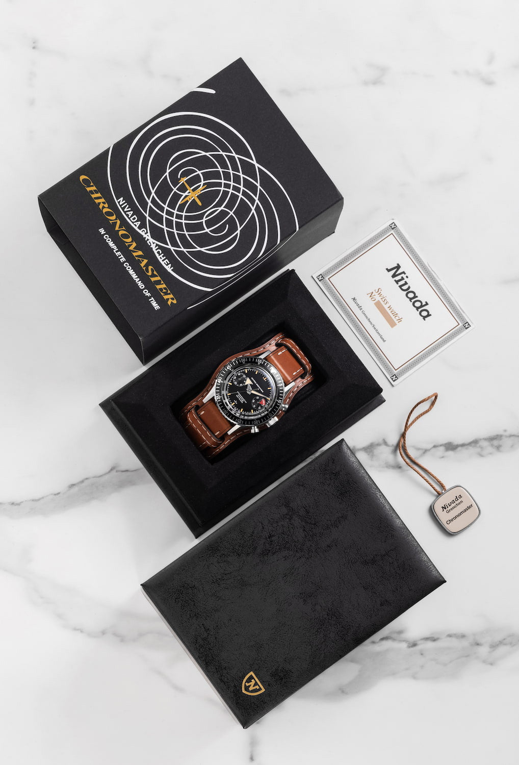 Nivada Grenchen Chronoking "Paul Newman" orange, läderarmband 87034Q17