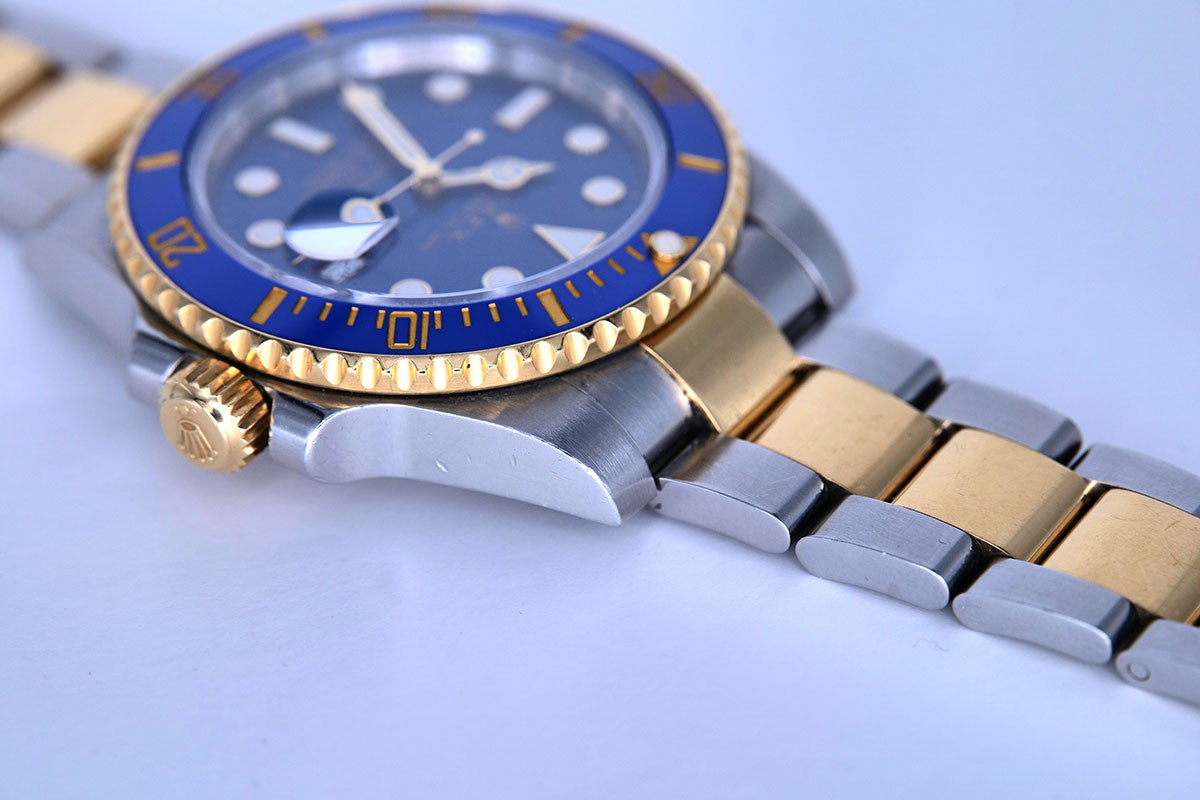 PRE-OWNED Rolex Submariner Blue Gold & Steel 116613LB