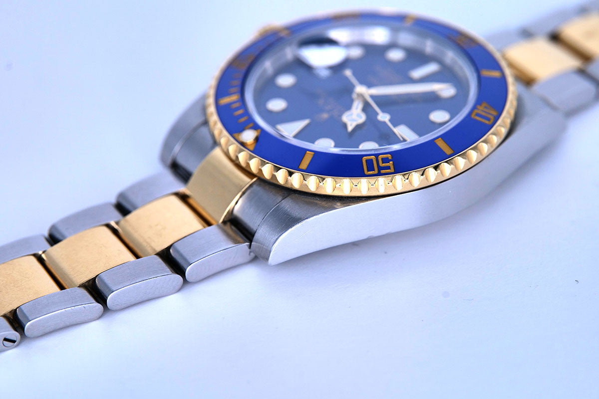 PRE-OWNED Rolex Submariner Blue Gold & Steel 116613LB