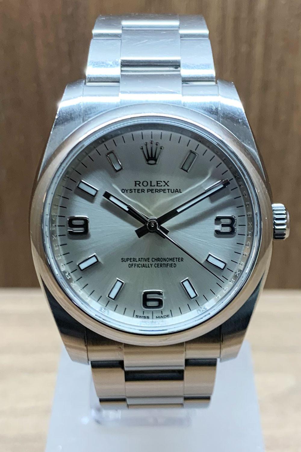 BEGAGNAD Rolex Oyster Perpetual 34 mm, silver och stålarmband 114200