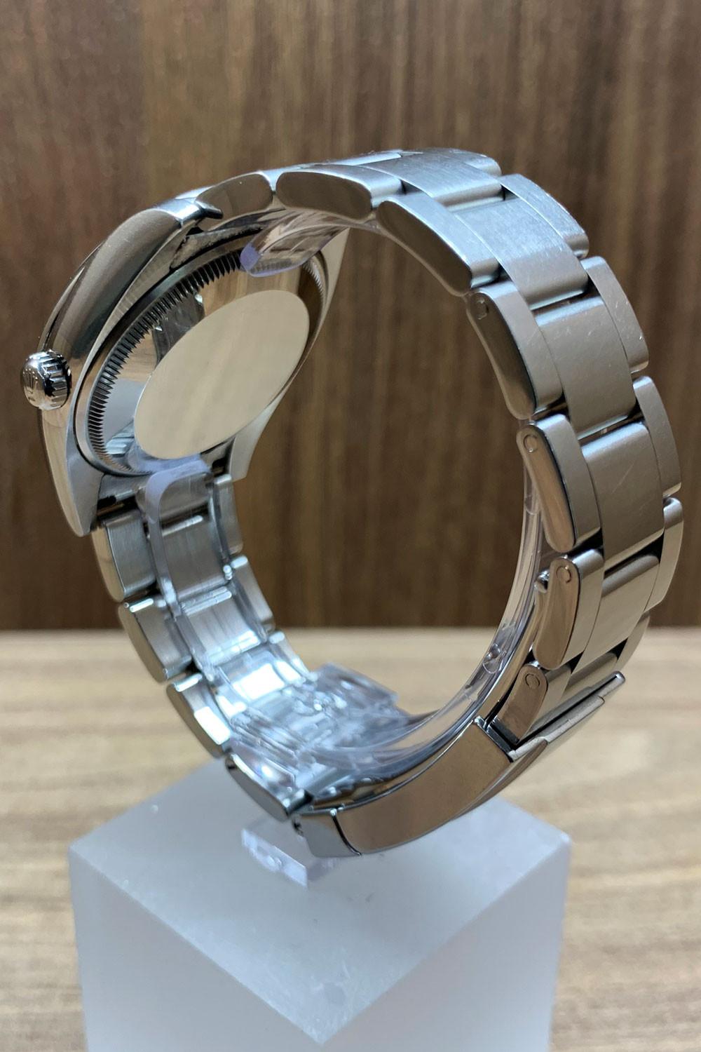 BEGAGNAD Rolex Oyster Perpetual 34 mm, silver och stålarmband 114200