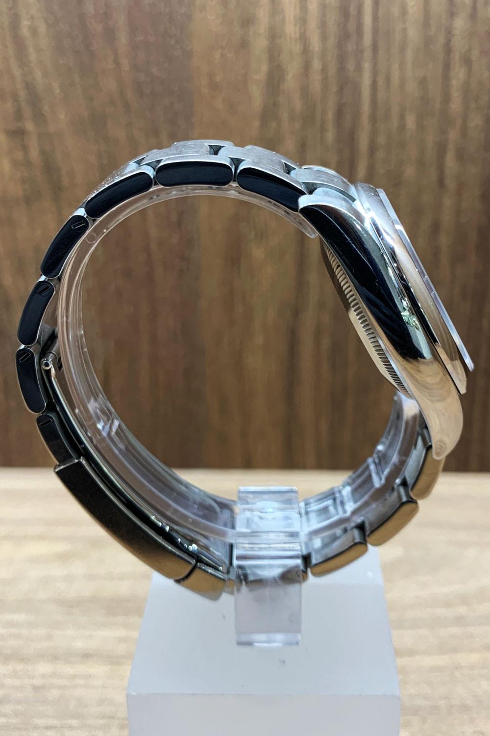 BEGAGNAD Rolex Oyster Perpetual 34 mm, silver och stålarmband 114200