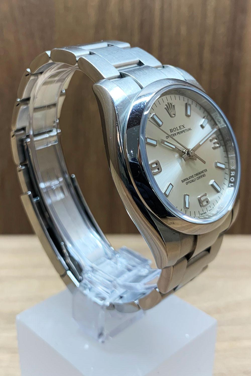 BEGAGNAD Rolex Oyster Perpetual 34 mm, silver och stålarmband 114200