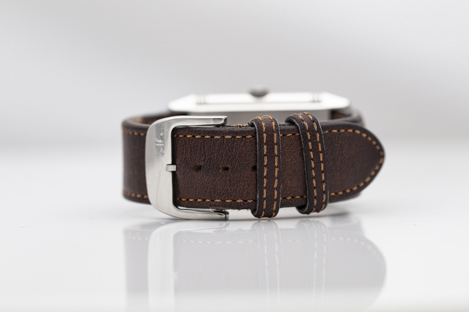 SÅLD – BEGAGNAD Jaeger-LeCoultre Reverso vit & läderarmband Q2438522