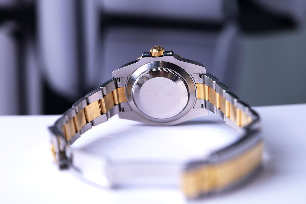 PRE-OWNED Rolex Submariner Date Black, Steel & Gold 116613L
