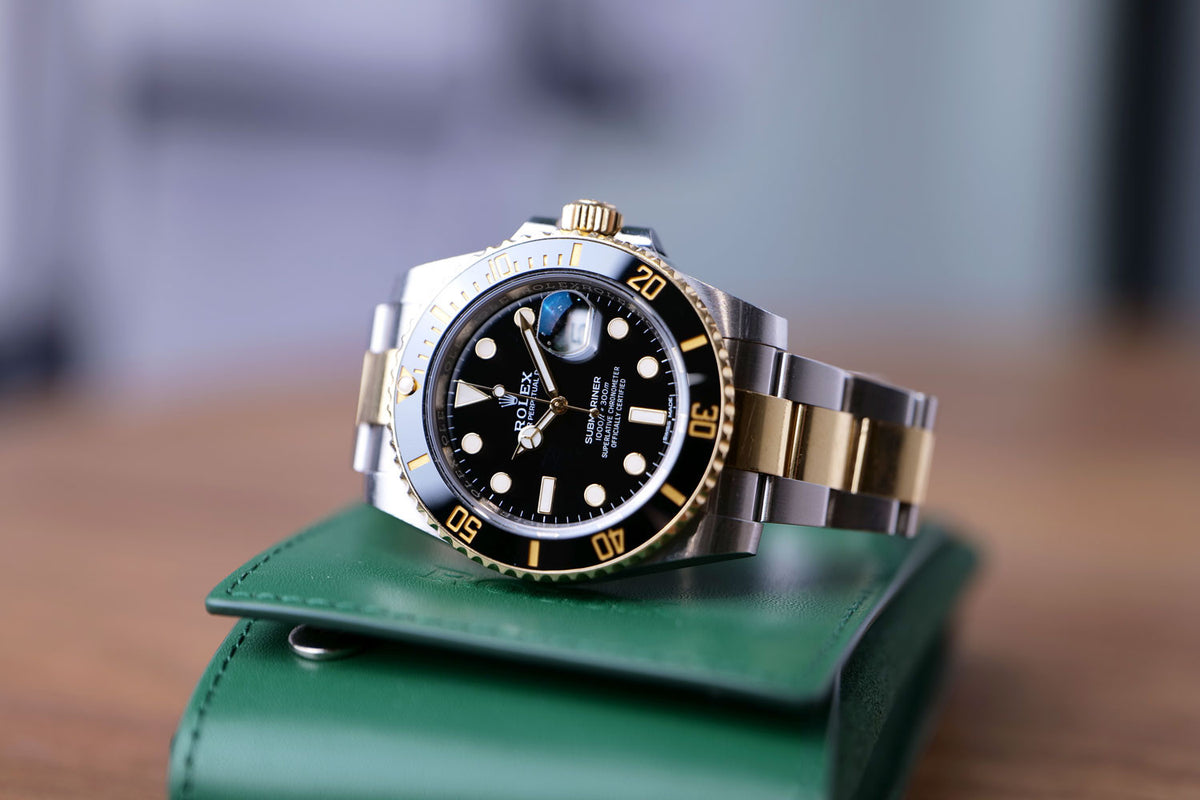 PRE-OWNED Rolex Submariner Date Black, Steel & Gold 116613L