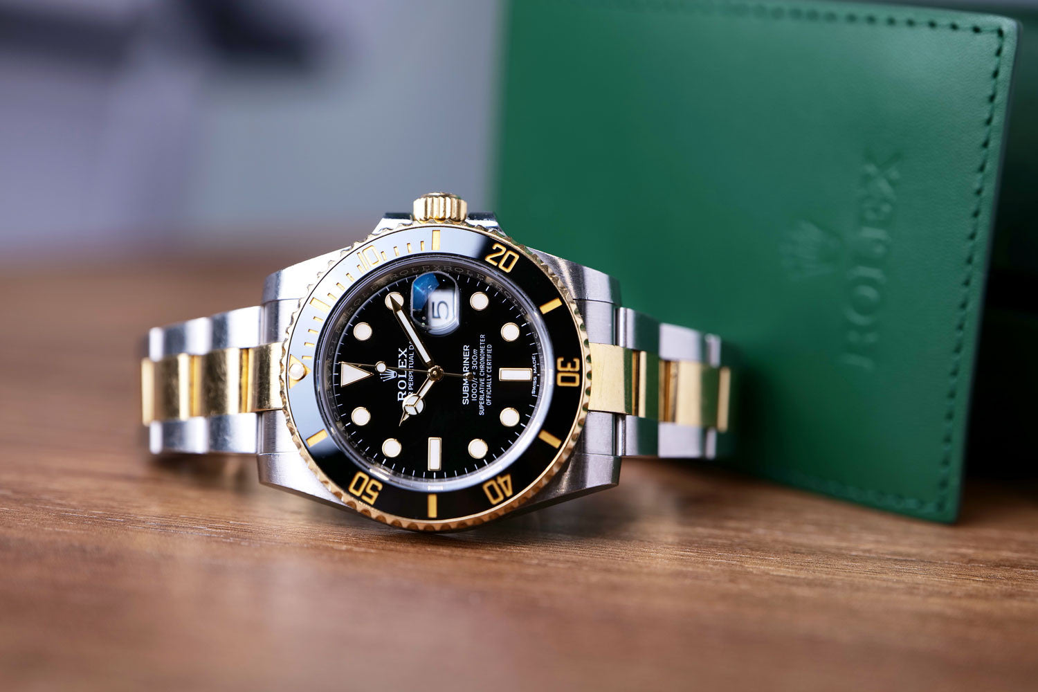 PRE-OWNED Rolex Submariner Date Black, Steel & Gold 116613L