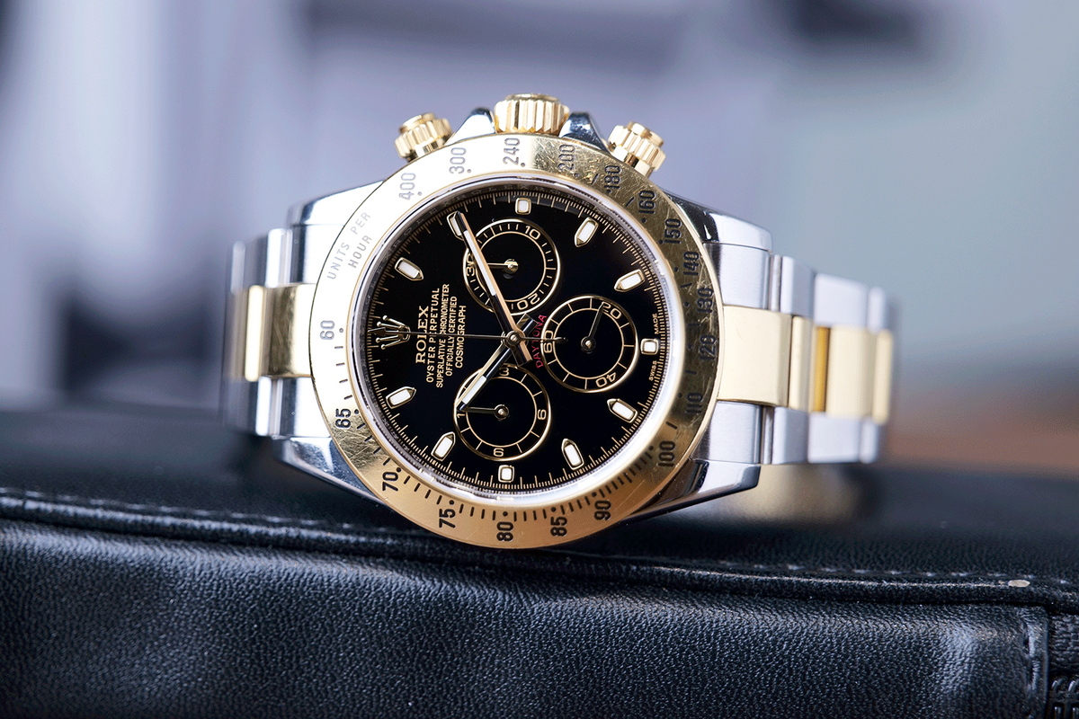 PRE-OWNED Rolex Daytona Gold & Steel 116523