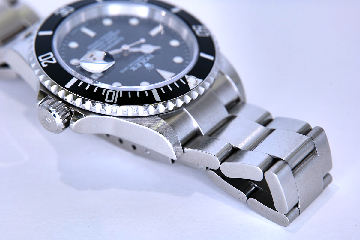 PRE-OWNED Rolex Submariner Date 16610