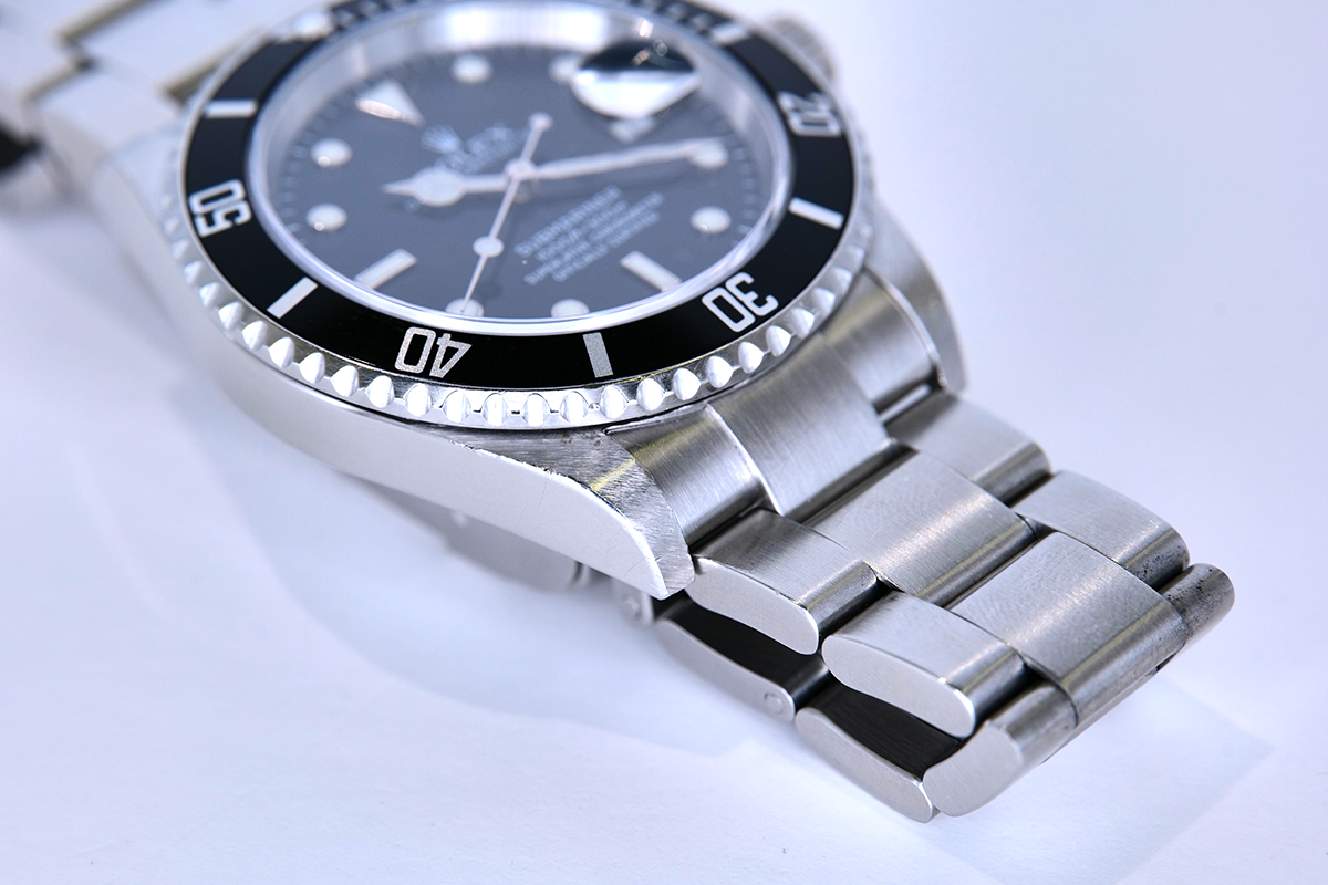 PRE-OWNED Rolex Submariner Date 16610
