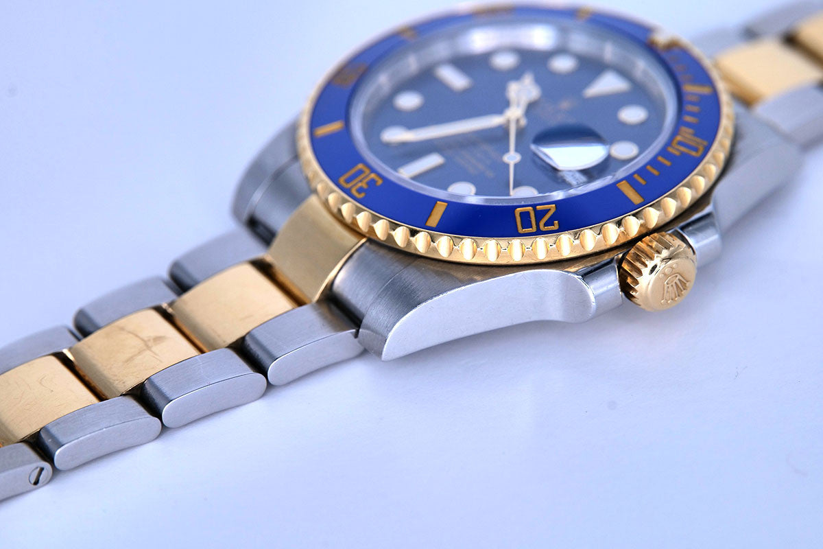 PRE-OWNED Rolex Submariner Blue Gold & Steel 116613LB