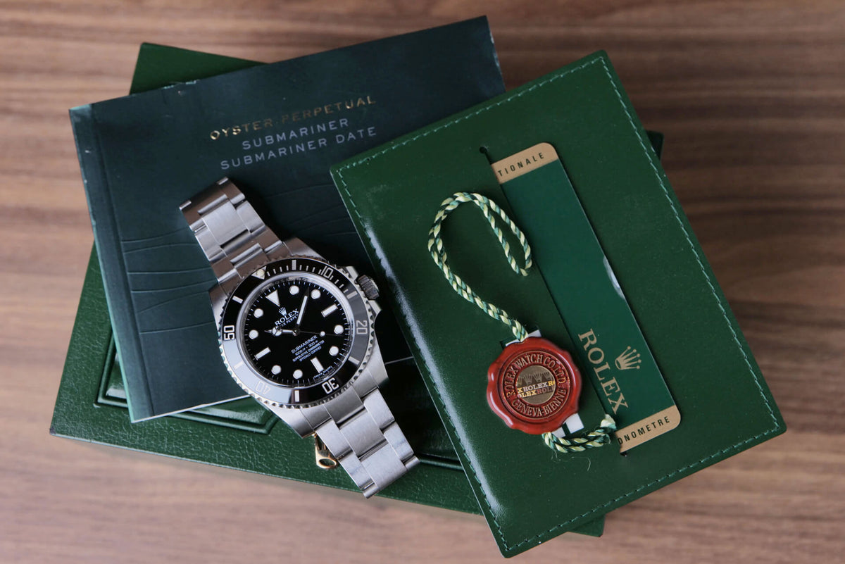 PRE-OWNED Rolex Oyster Perpetual Submariner No-Date 114060