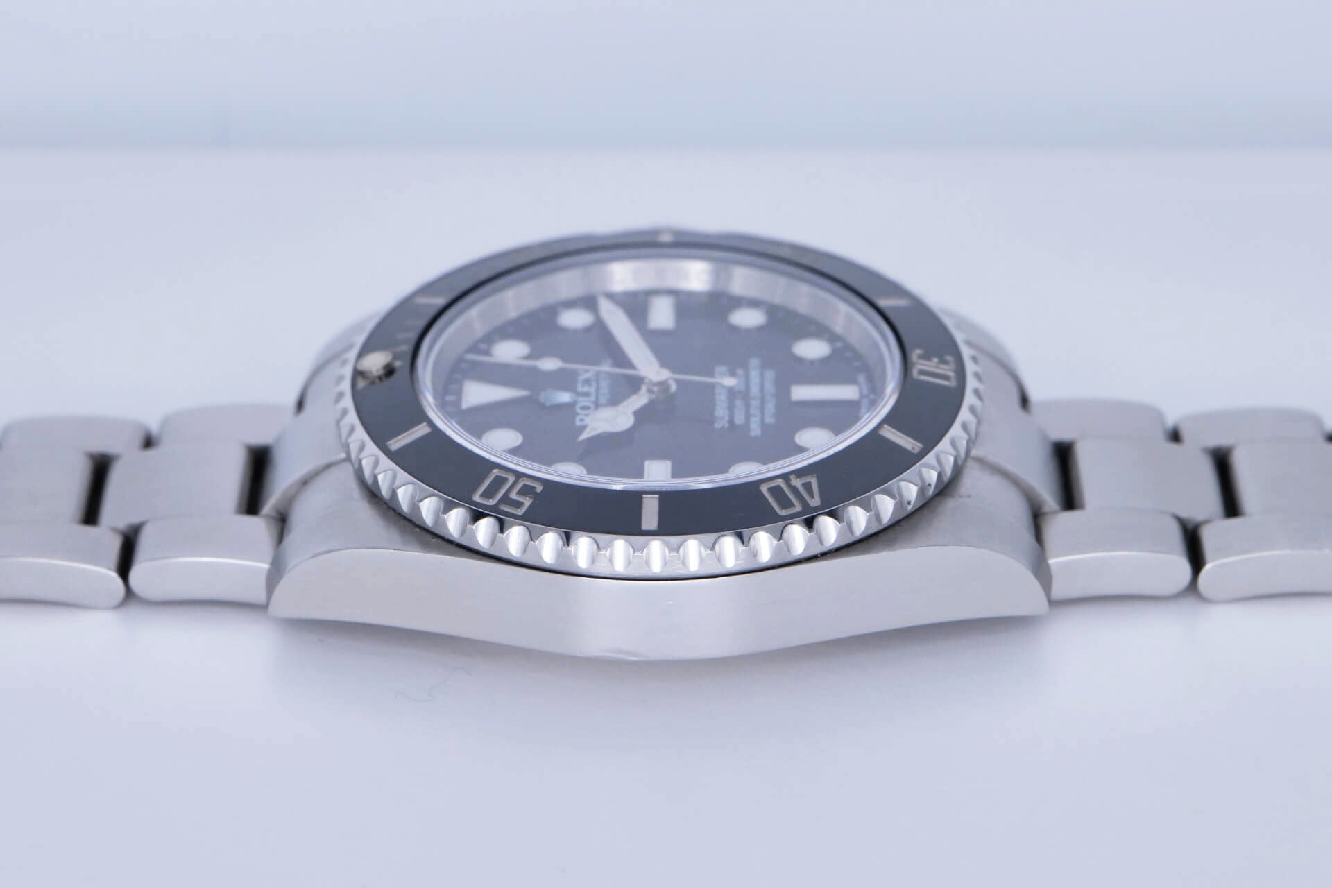 PRE-OWNED Rolex Oyster Perpetual Submariner No-Date 114060