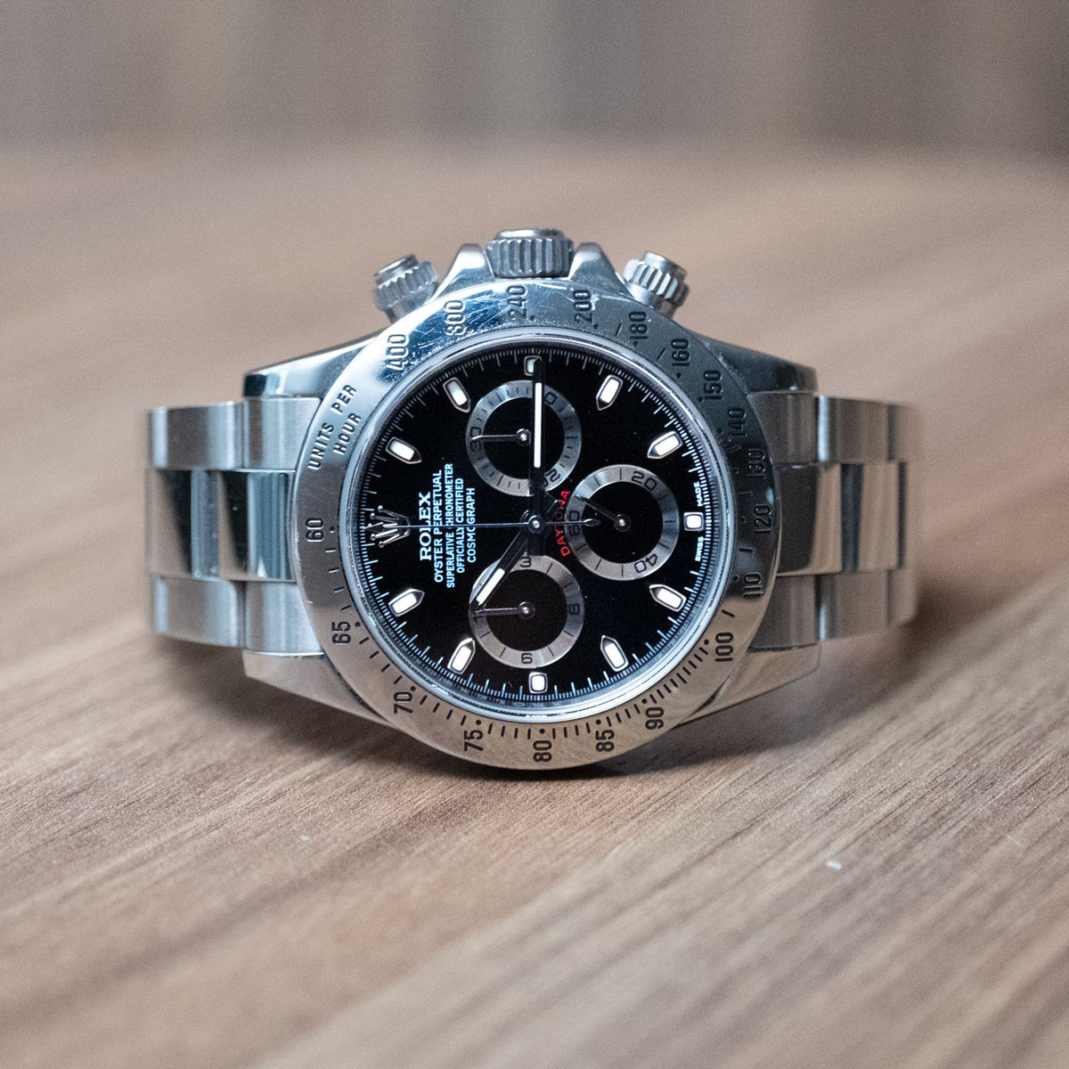 PRE-OWNED Rolex Daytona Black & Steel 116520