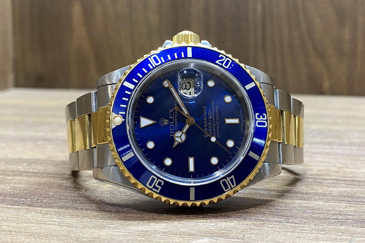 PRE-OWNED Rolex Submariner Steel & Gold 16613