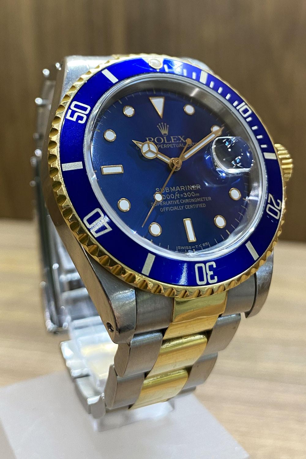 PRE-OWNED Rolex Submariner Steel & Gold 16613